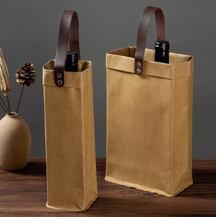 China Factory Wholesale 100% Reusable Kraft Paper Bags with PU Leather Handles,Eco-Friendly Natural Kraft Paper Storage Bag for Packaging Flowers/Wine/Rice/Food