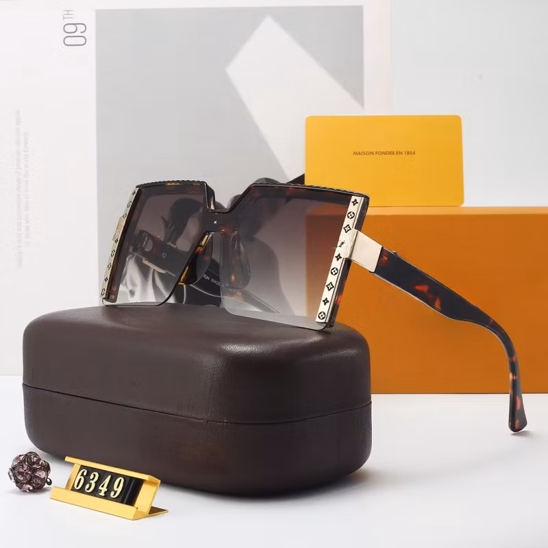 New Popular Men′s Women′s Sunglasses Factory Price Wholesale Price Luxury Brand Designer Design Style Fashion Sunglasses