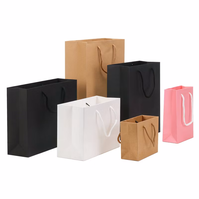Wholesale Custom Printed Logo Reusable Shopping Clothing Packaging Paper Bags with Handle