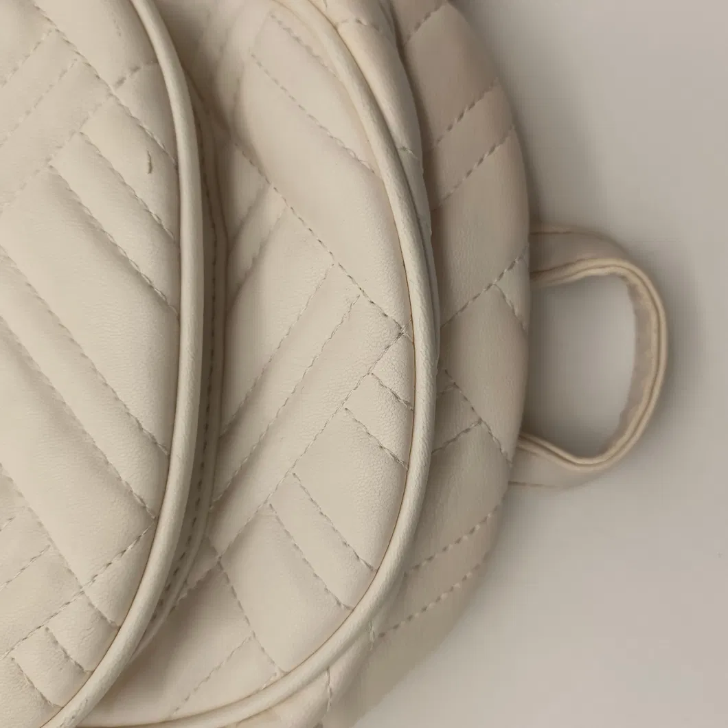 The Beige Semi Circular Diamond Sewn PU Backpack Has Multiple Layers of Pockets.