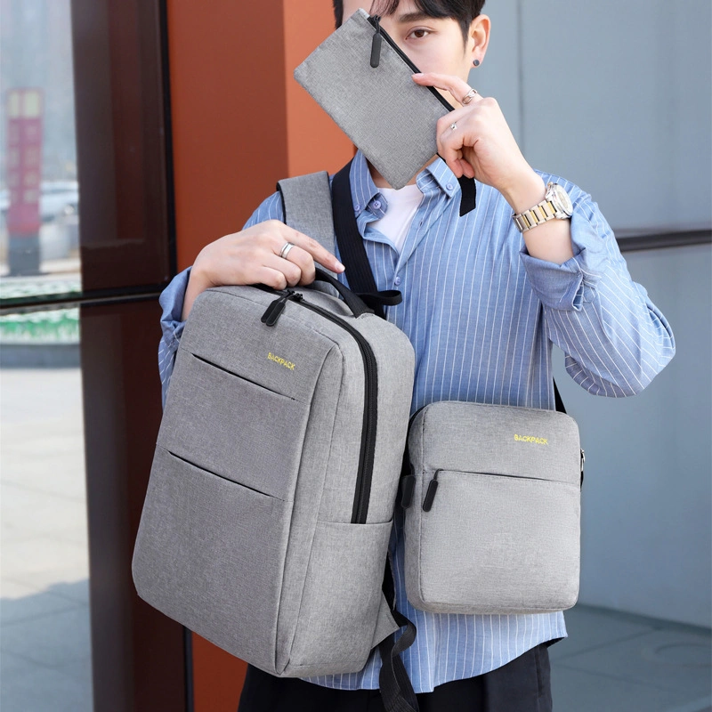 Men&prime;s Business Backpack Korean Version of USB Rechargeable Leisure Female Student Bag Simple Fashion Computer Bag Set of Three.