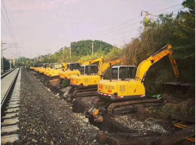 Tracked Excavator Bolt on Whale Fin Blade Ballast and Insert Ties From Hi-Railed Position for Working