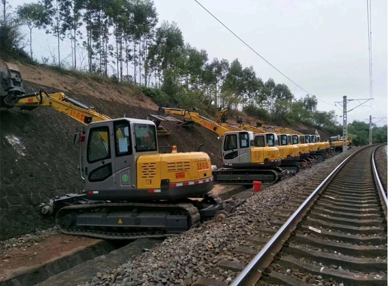 Tracked Excavator Bolt on Whale Fin Blade Ballast and Insert Ties From Hi-Railed Position for Working