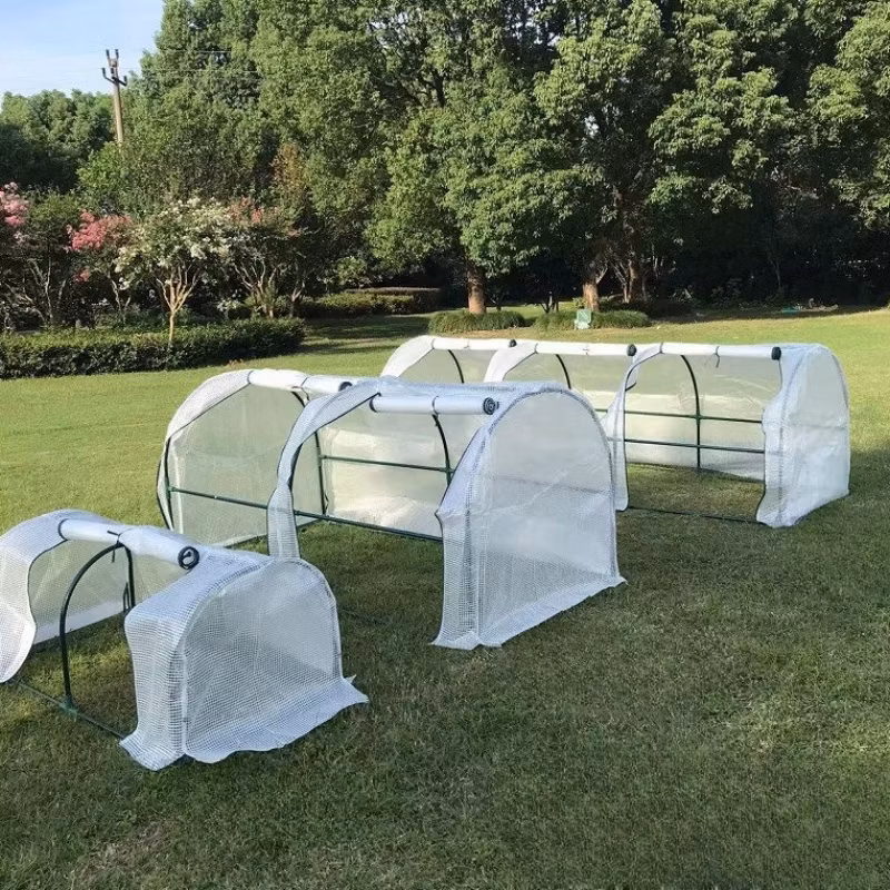 Versatile Tower Greenhouse for Year-Round Plant Growth and Protection