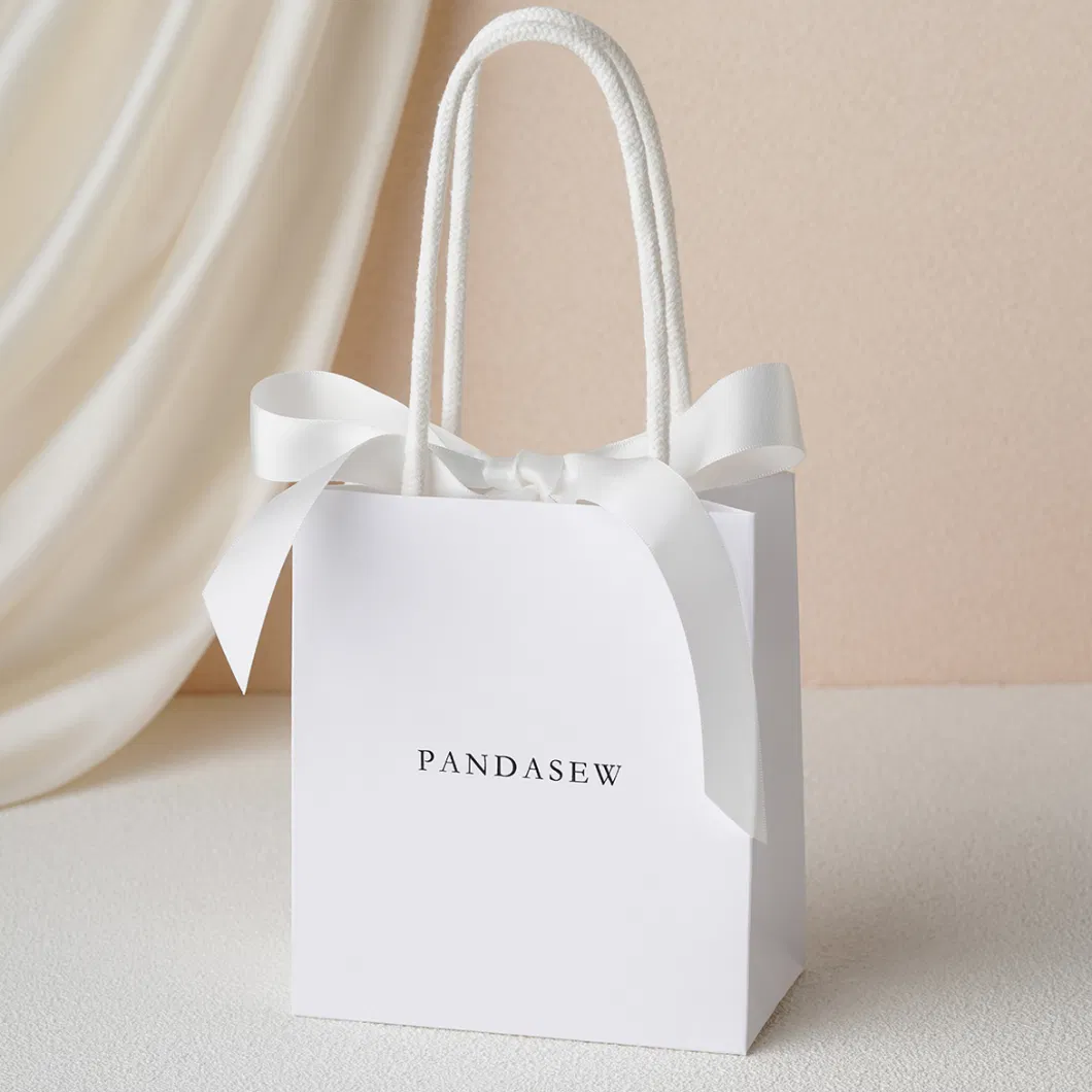 Pandasew Custom Logo White Bowknot Ribbon Kraft Handle Shopping Jewelry Art Cosmetic Handle Gift Kraft Paper Package Bag