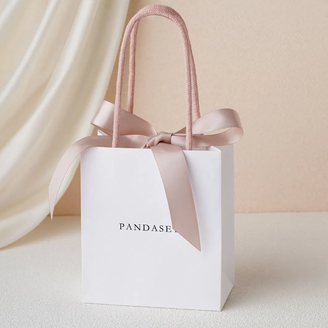 Pandasew Custom Logo White Bowknot Ribbon Kraft Handle Shopping Jewelry Art Cosmetic Handle Gift Kraft Paper Package Bag