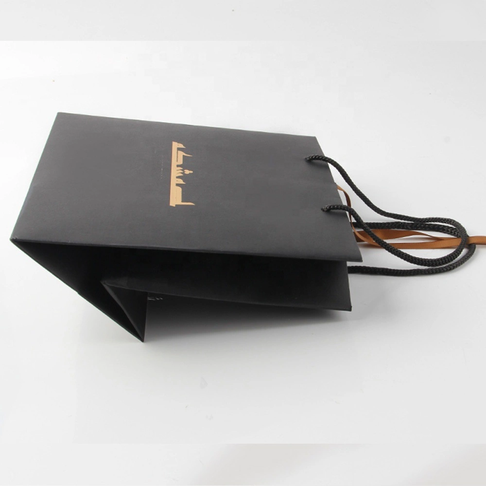 China Common Large Horizontal Shopping Brown Kraft Paper Bag with Handle Custom Print for Garment