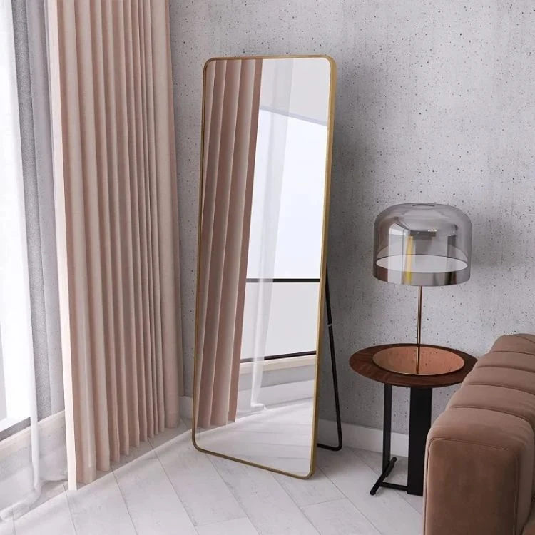 Wall Mirrors Hang From The Full Length Floor of The Bedroom