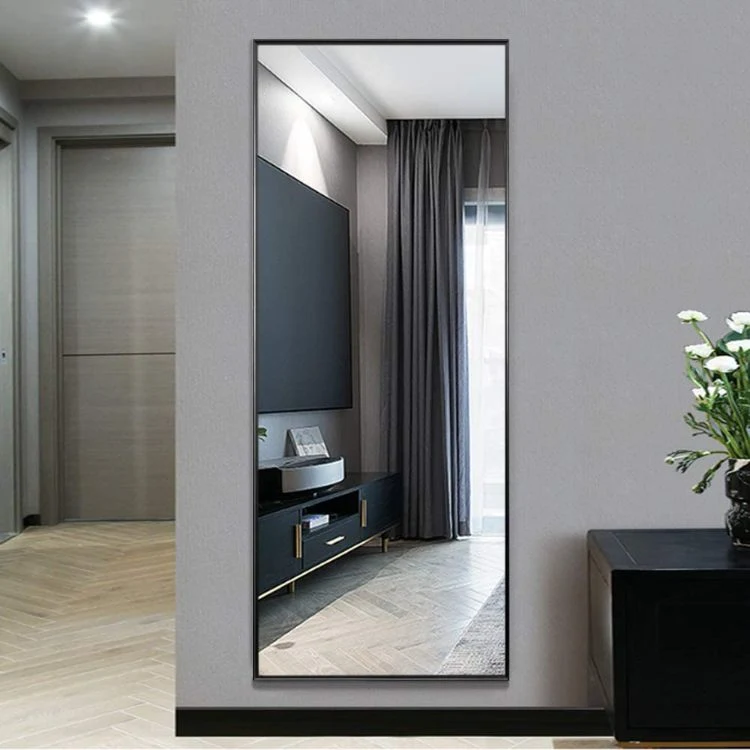 Wall Mirrors Hang From The Full Length Floor of The Bedroom